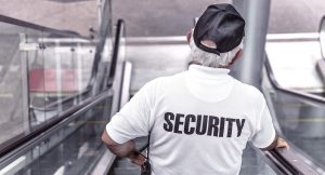 security, man, escalator, police, guard, officer, surveillance, control, monitoring, safety, uniform, back view, security, security, security, security, security, police, safety